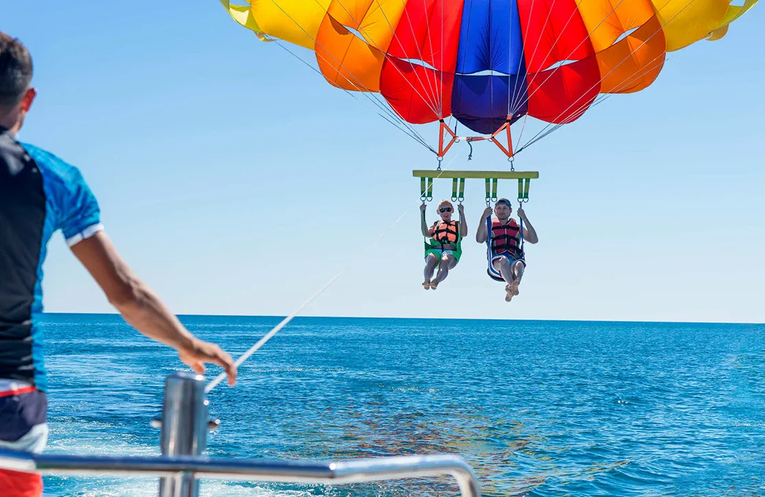 Parasailing in the Mediterranean on a yacht charter