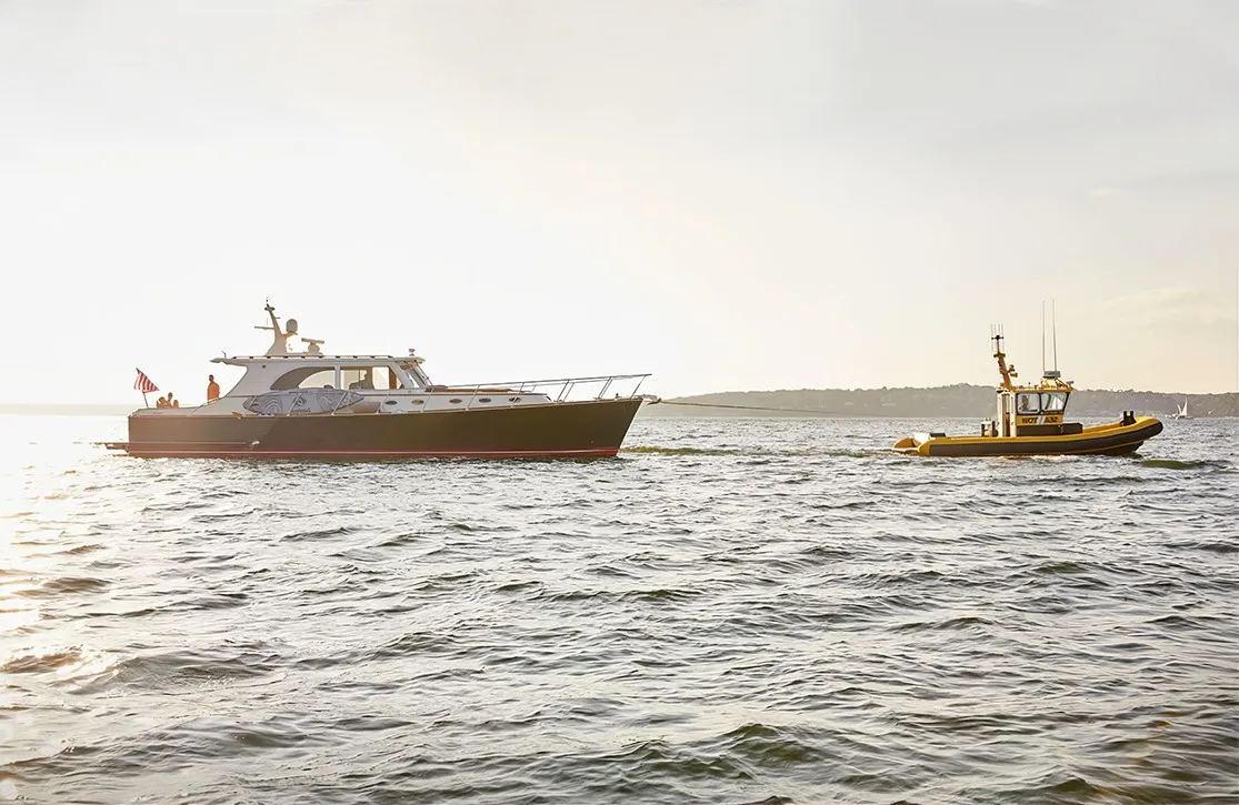 Assisting a yacht in tow.