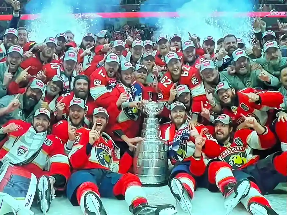 yachting family office services professionals in sports and team owners - florida panthers Stanley cup winners team photo on the ice 