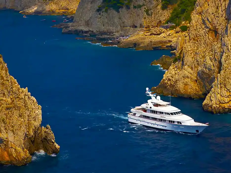 Yacht on the coast of Italy showcasing lime luxury yacht marketing photography