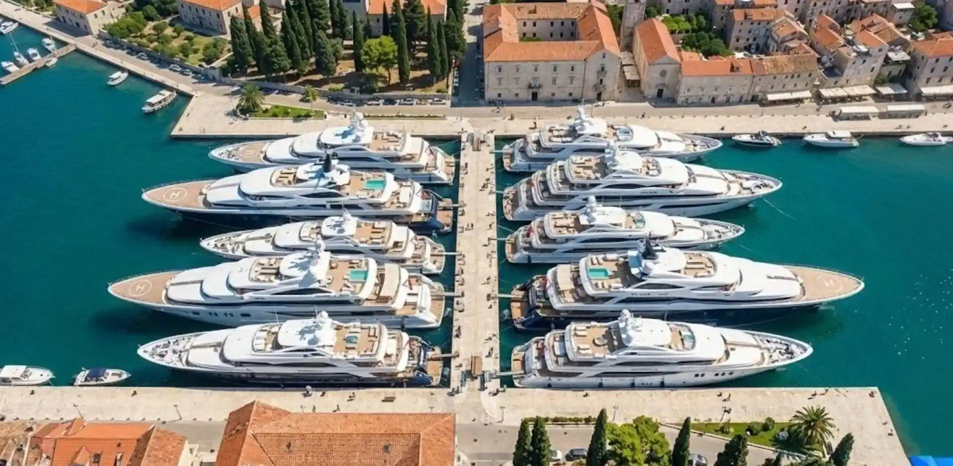 240 ft yachts for sale in Miami with more 240 ft yachts for charter in the background. Photos, plans, price and specifications