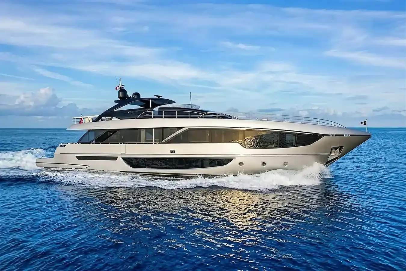 AIM yacht, a 99 ft Riva luxury superyacht underway, 30.24 meters, built in 2024.