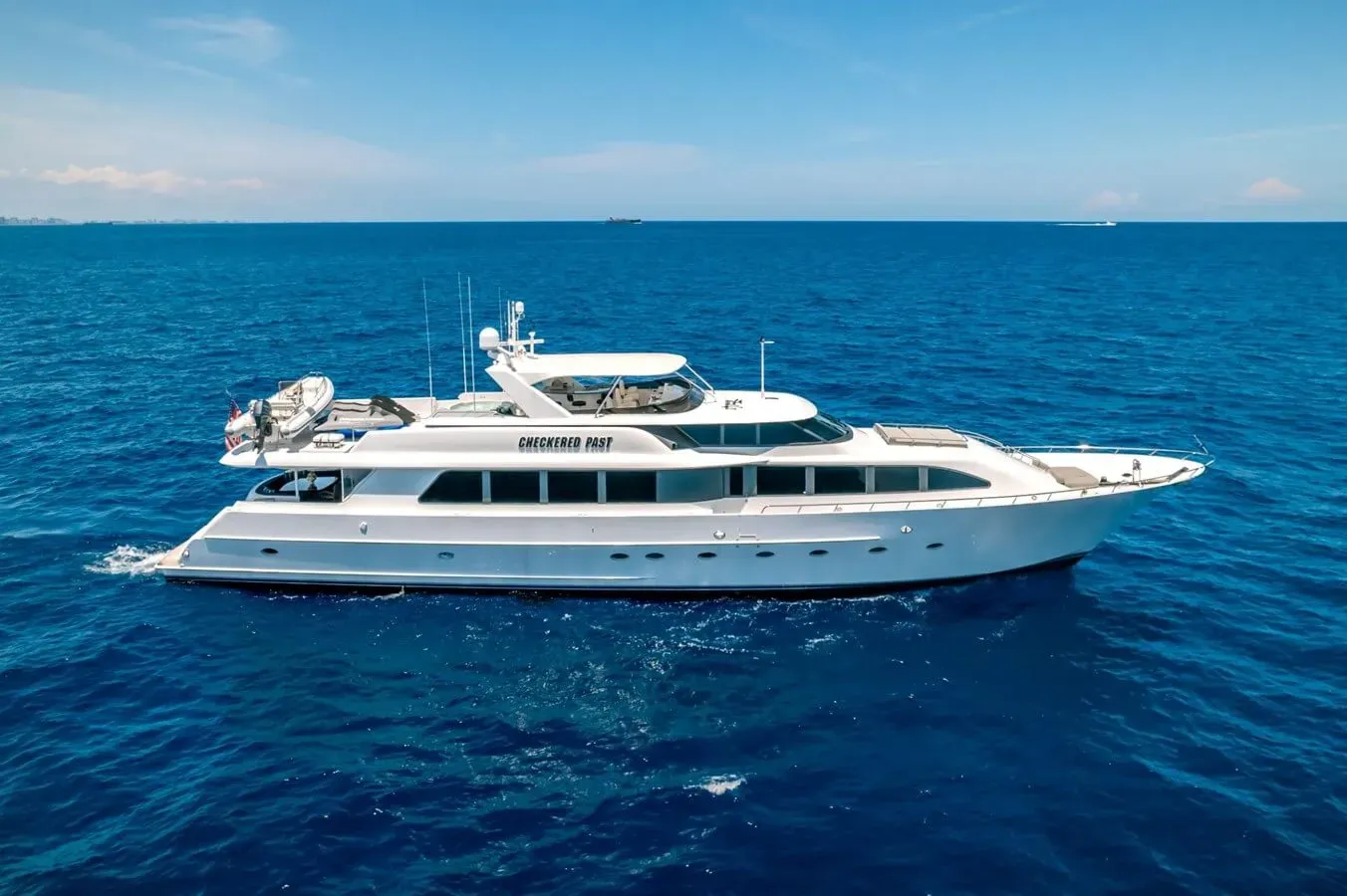 Checkered Past yacht, a 112 ft Westport luxury superyacht underway, 34.14 meters, built in 1999, 2014.