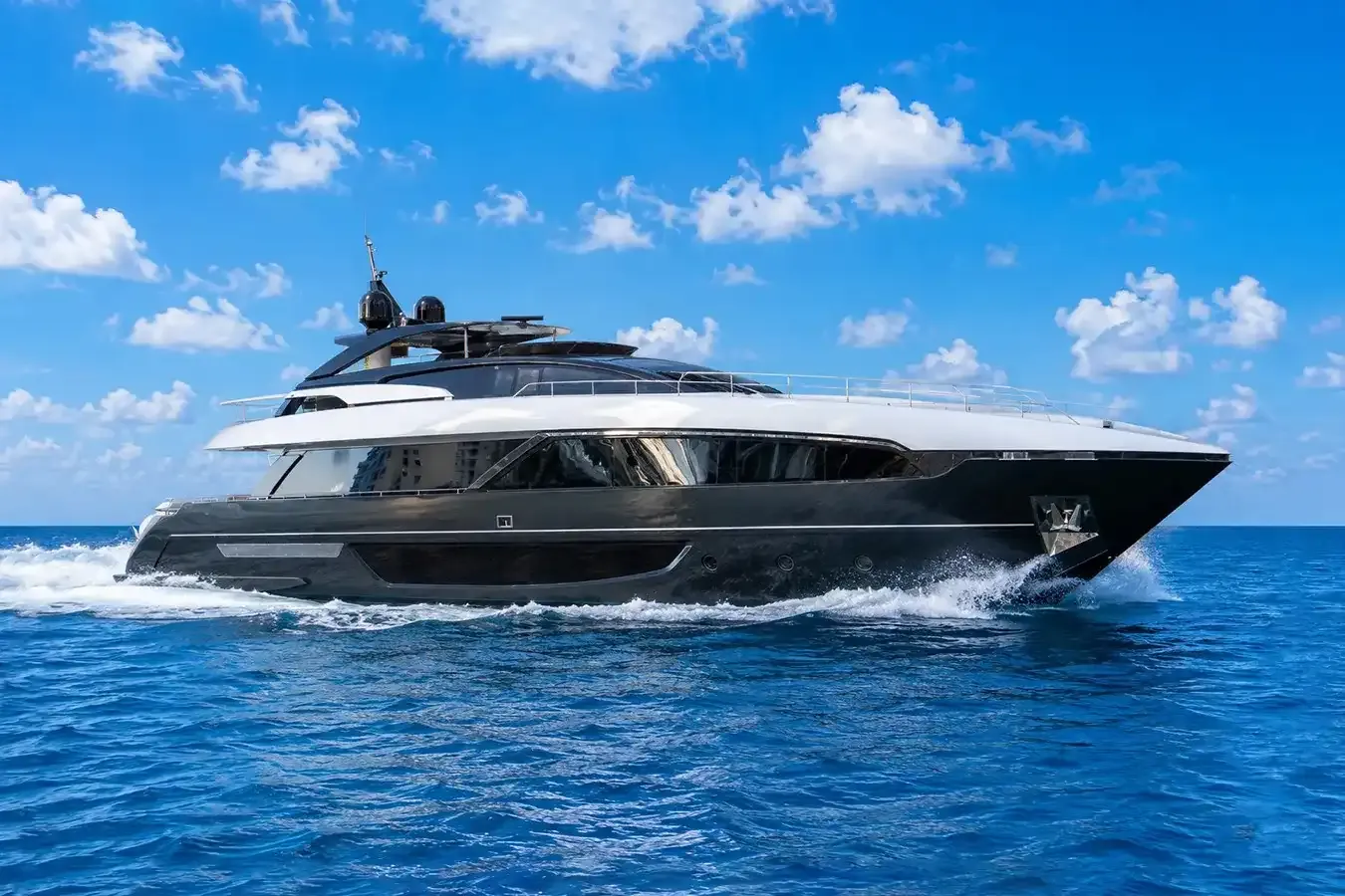 Convict yacht, a 98 ft Riva luxury superyacht underway, 30 meters, built in 2019.