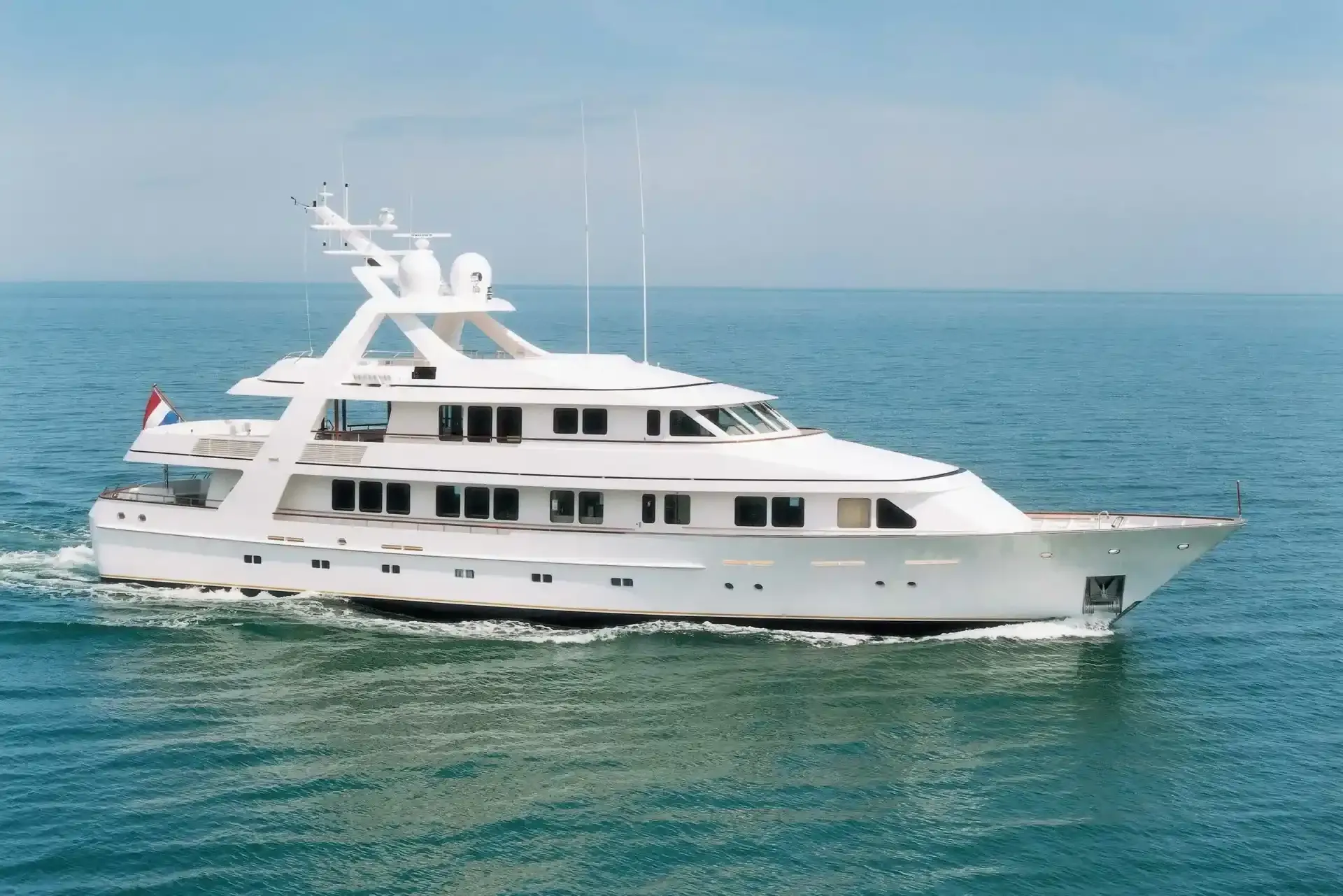 Corinthian yacht, a 128 ft Feadship luxury superyacht underway, 39.05 meters, built in 1997.