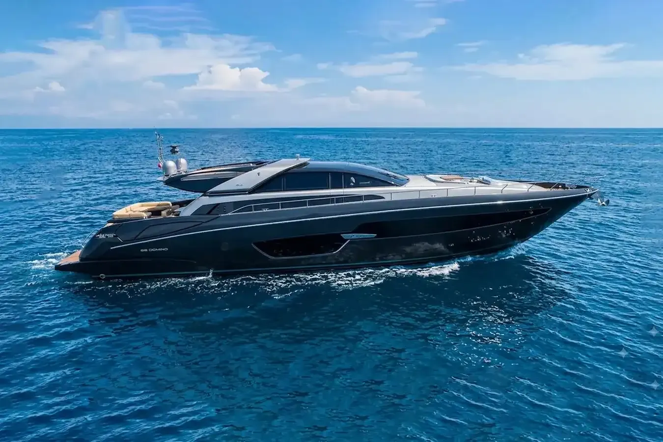 Friday 13th yacht, a 88 ft Riva luxury superyacht underway, 26.84 meters, built in 2015.
