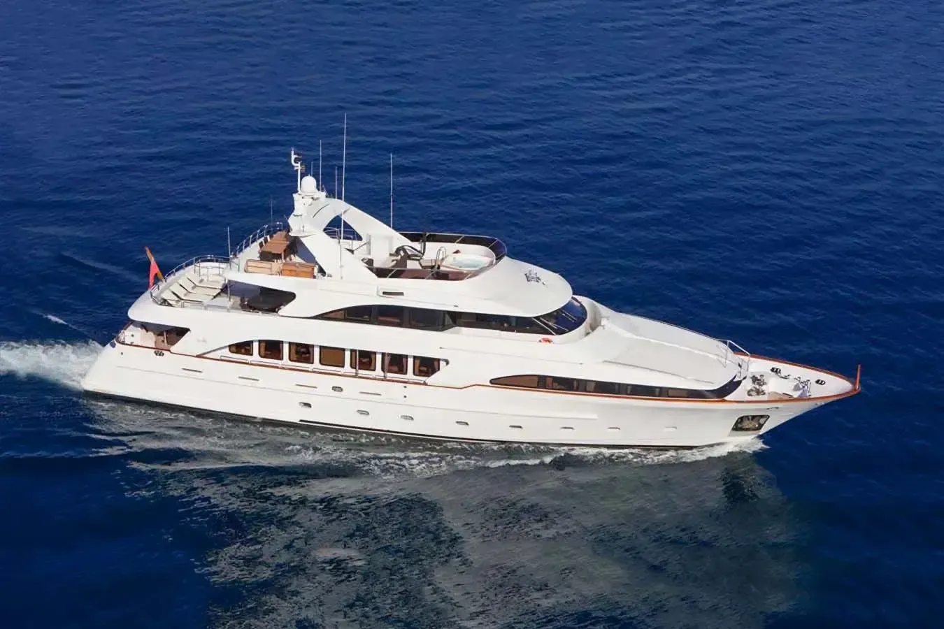 Friendship yacht, a 115 ft Benetti luxury superyacht underway, 35.1 meters, built in 2000.