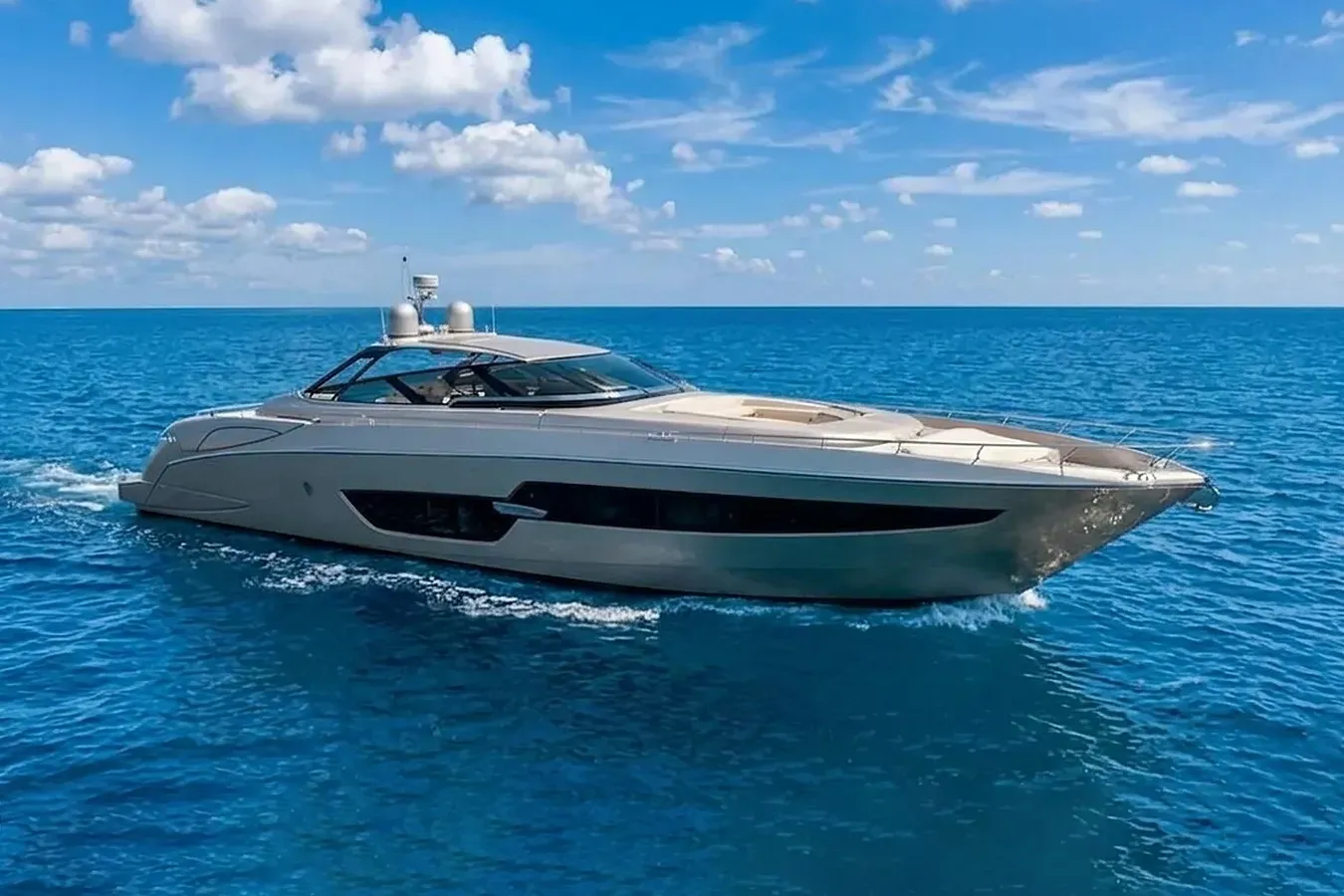 Mine yacht, a 88 ft Riva luxury superyacht underway, 26.84 meters, built in 2015.