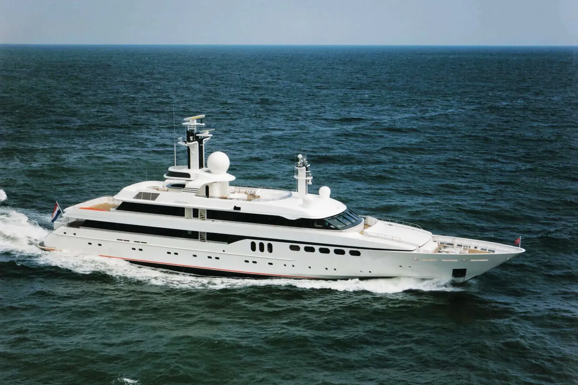 Mylin IV yacht, a 200 ft Feadship luxury superyacht underway, 61 meters, built in 1992, 2009.