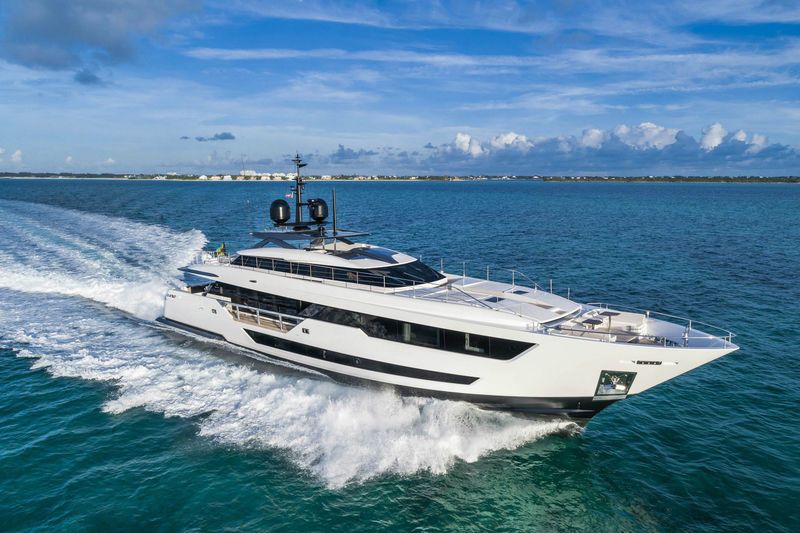 Never Blue yacht, a 125 ft Custom Line luxury superyacht underway, 38.36 meters, built in 2018.