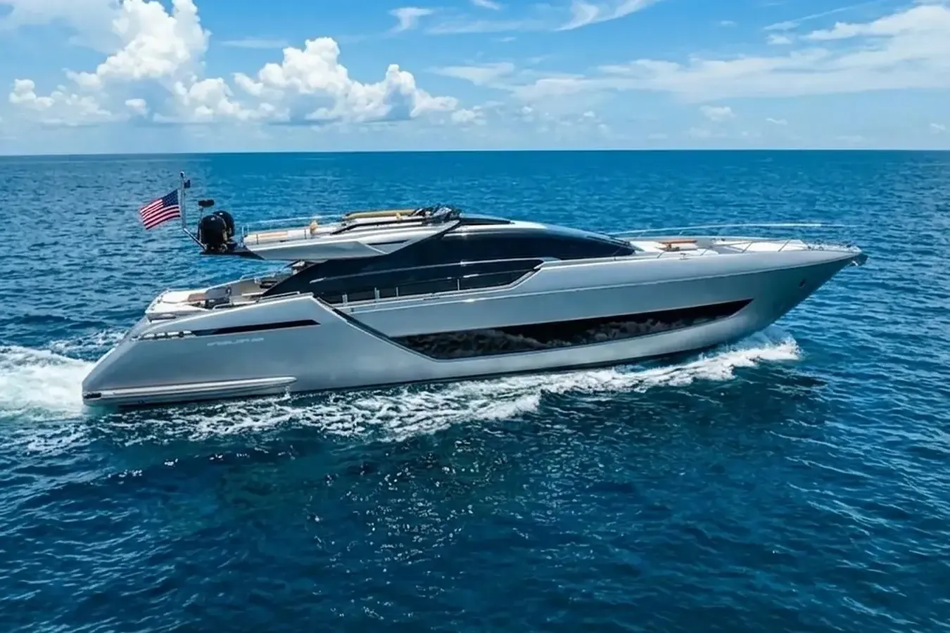 Red yacht, a 88 ft Riva luxury superyacht underway, 26.92 meters, built in 2024.