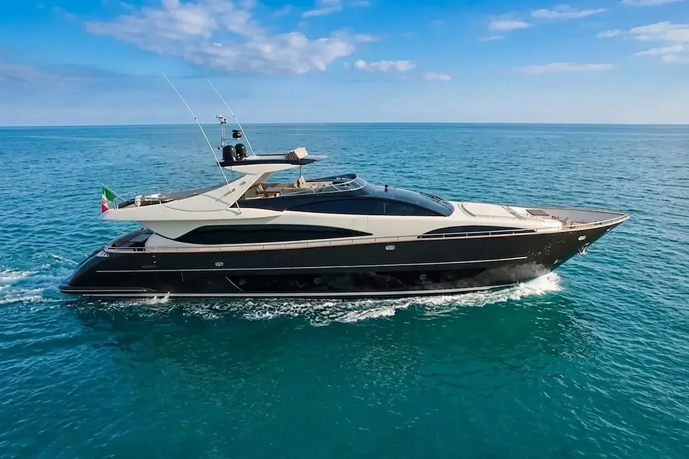 Ruff One II yacht, a 92 ft Riva luxury superyacht underway, 28.23 meters, built in 2011.