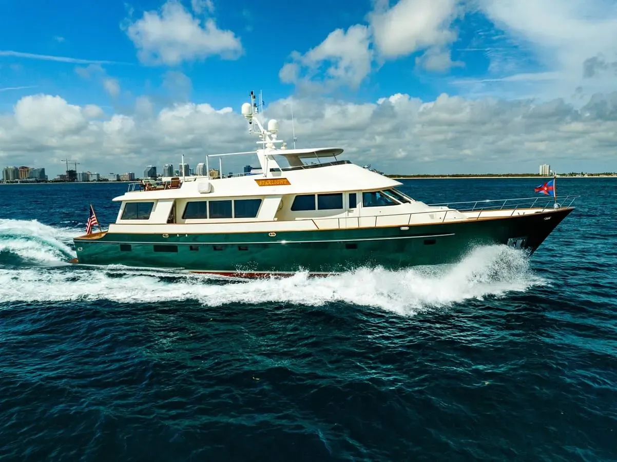 Starlight yacht, a 106 ft Derecktor luxury superyacht underway, 32.31 meters, built in 2003, 2023.