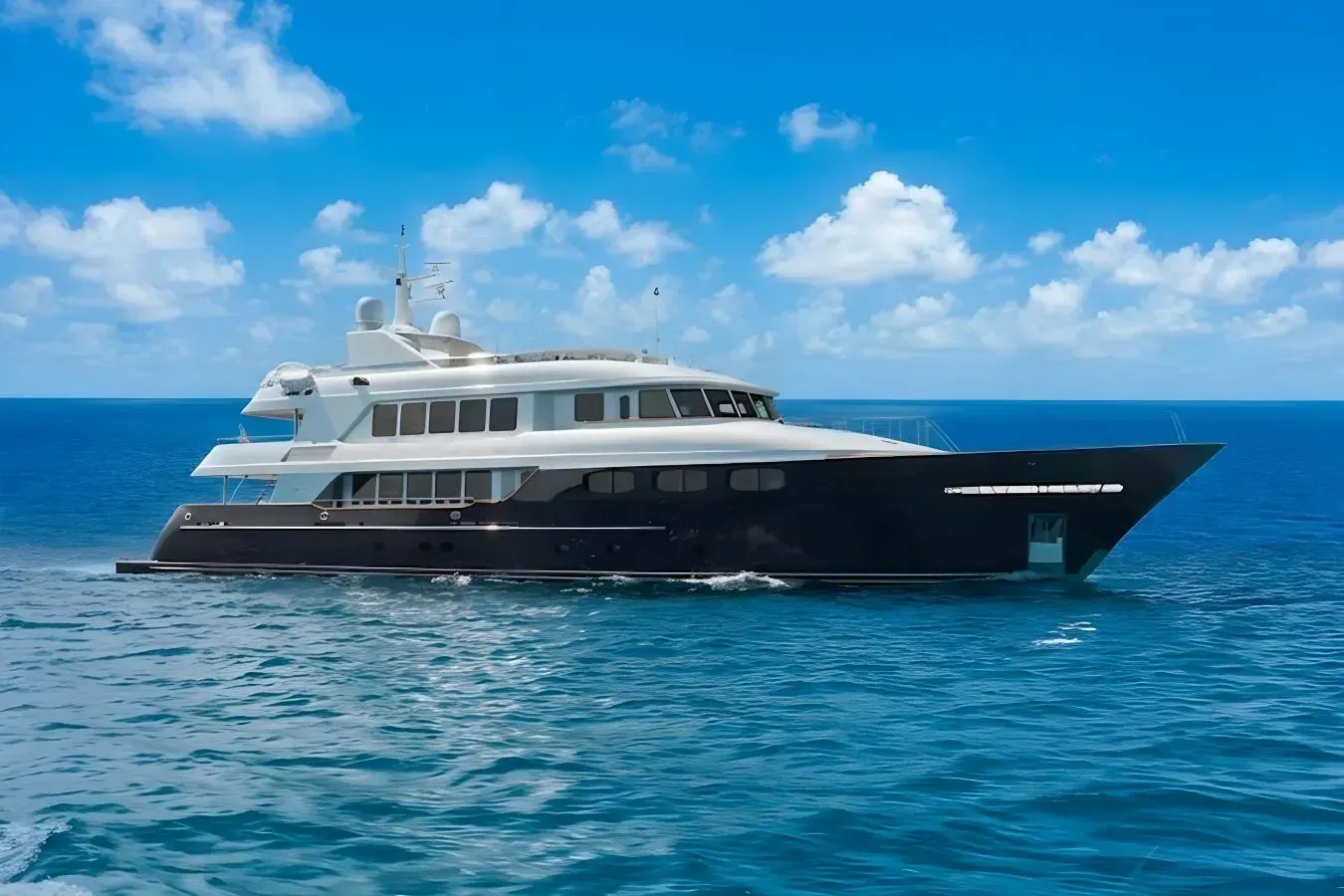 SummerDance yacht, a 145 ft Trinity luxury superyacht underway, 44.23 meters, built in 2004.