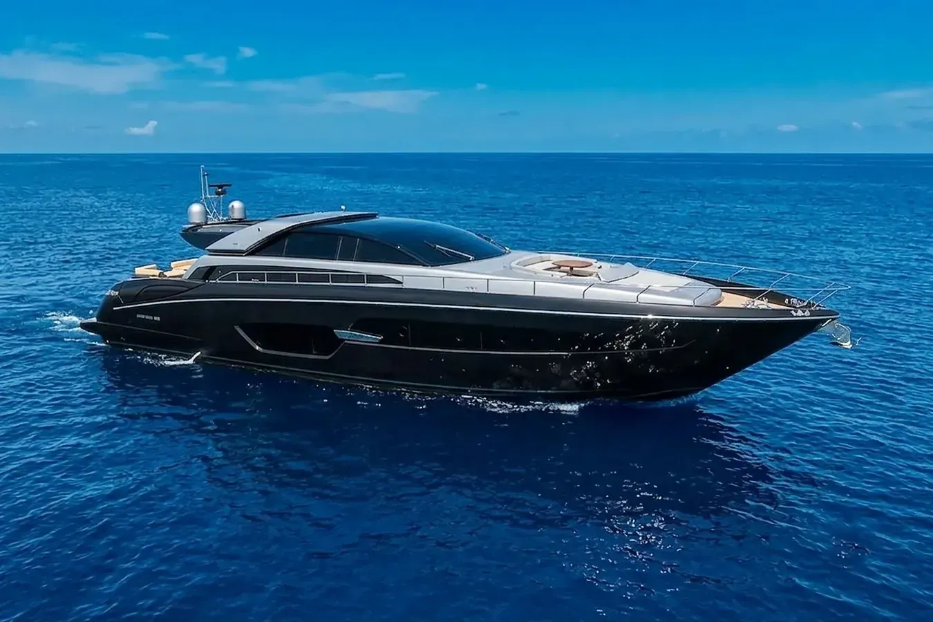 The First Signs yacht, a 88 ft Riva luxury superyacht underway, 26.84 meters, built in 2019.