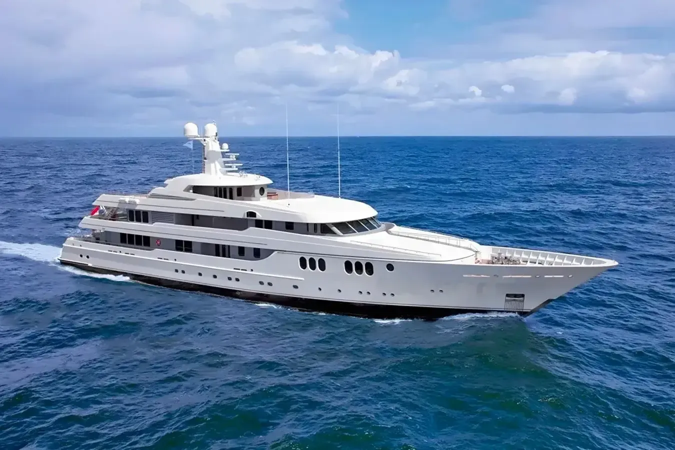 Trident yacht, a 214 ft Feadship luxury superyacht underway, 65.22 meters, built in 2009.