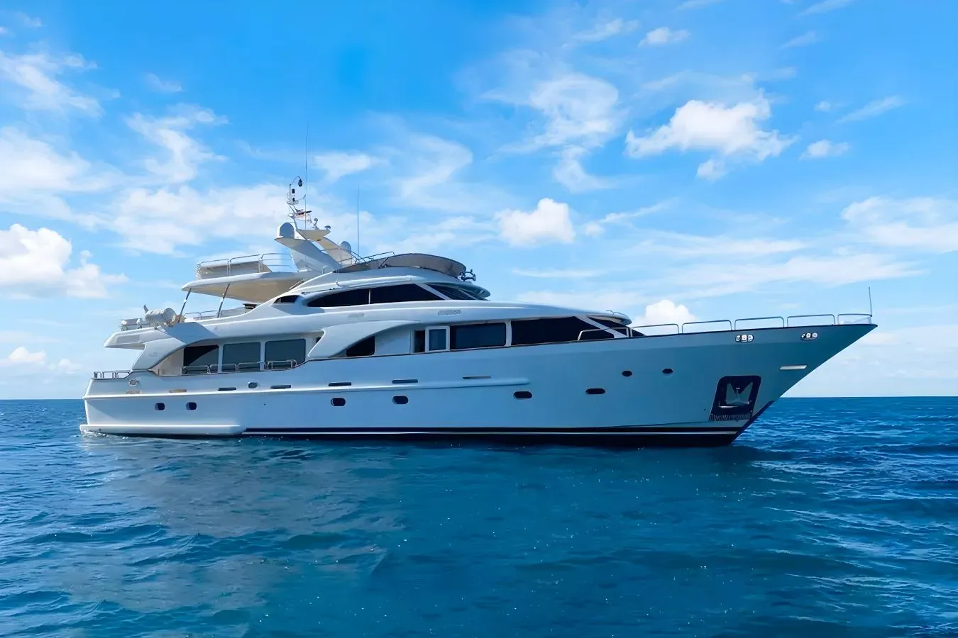 Turk's yacht, a 99 ft Benetti Yachts luxury superyacht underway, 30.2 meters, built in 2007.