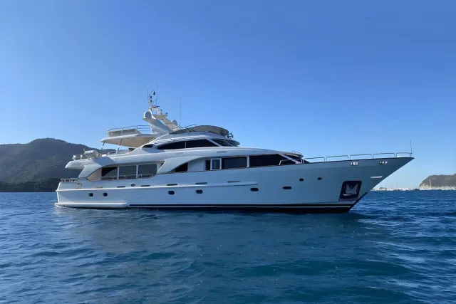 Turk's yacht, a 99 ft Benetti luxury superyacht underway, 30.2 meters, built in 2007.