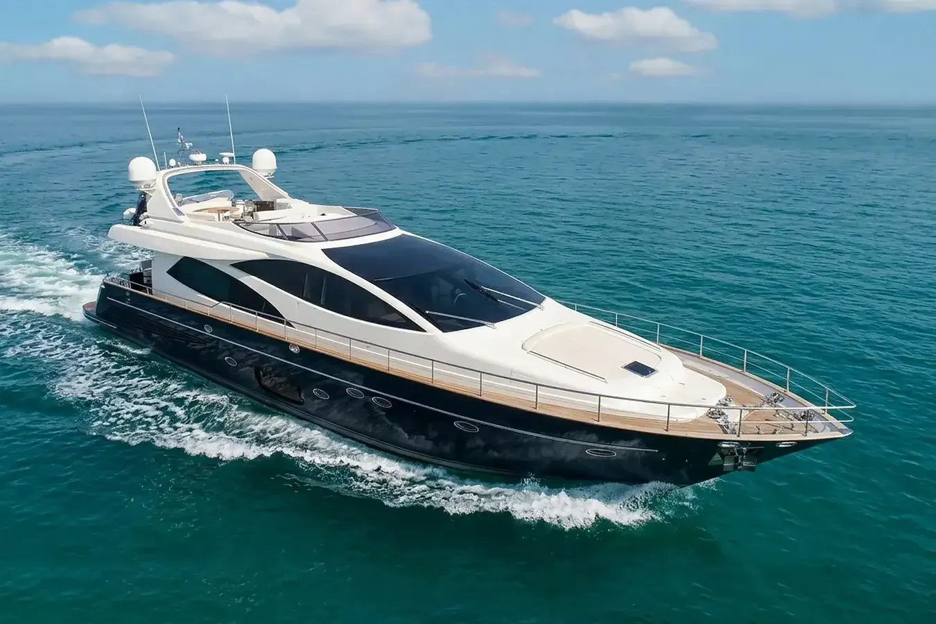 Wedge Three yacht, a 85 ft Riva luxury superyacht underway, 25.91 meters, built in 2007.